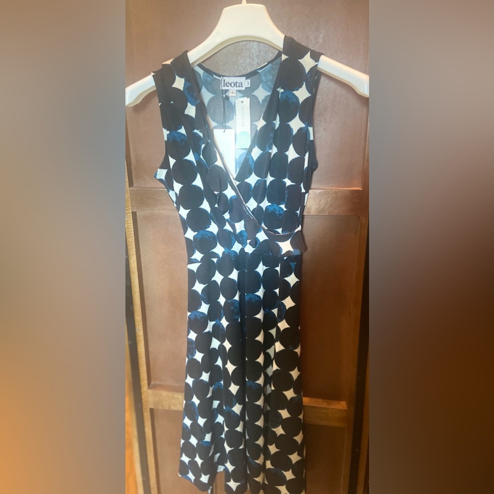 Sleeveless midnight moon dress. Wrap tie.